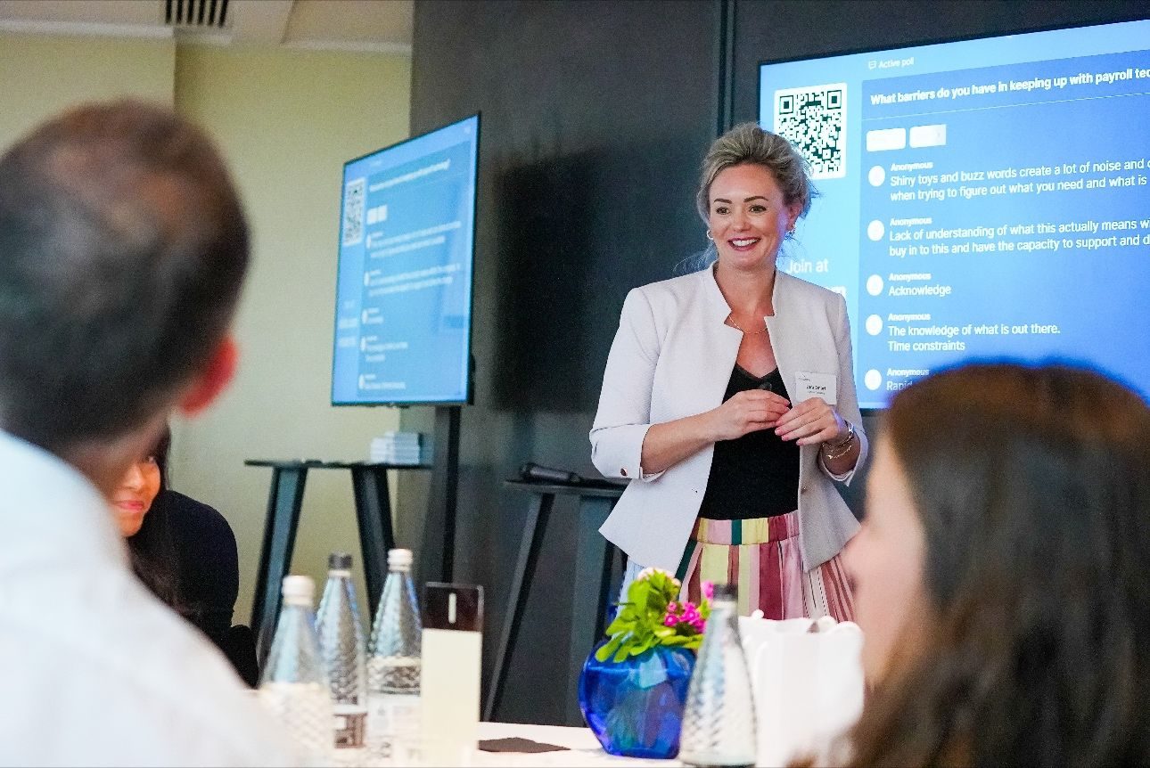 Lara Smart presenting to payroll leaders